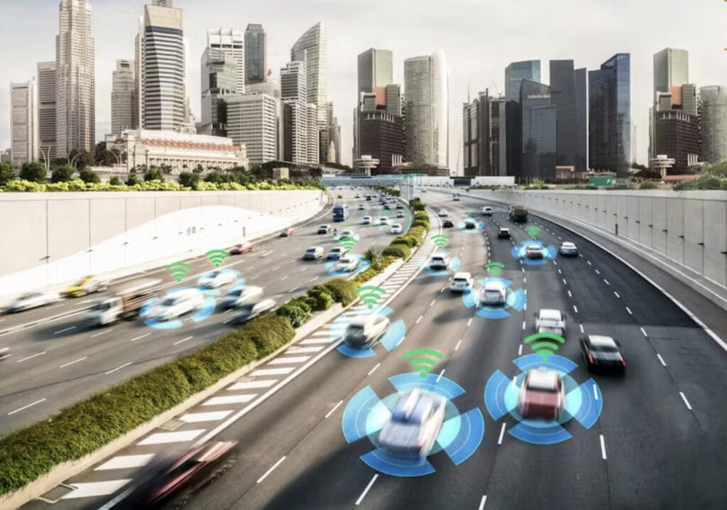 An image of cars driving on a highway with wi-fi technology.