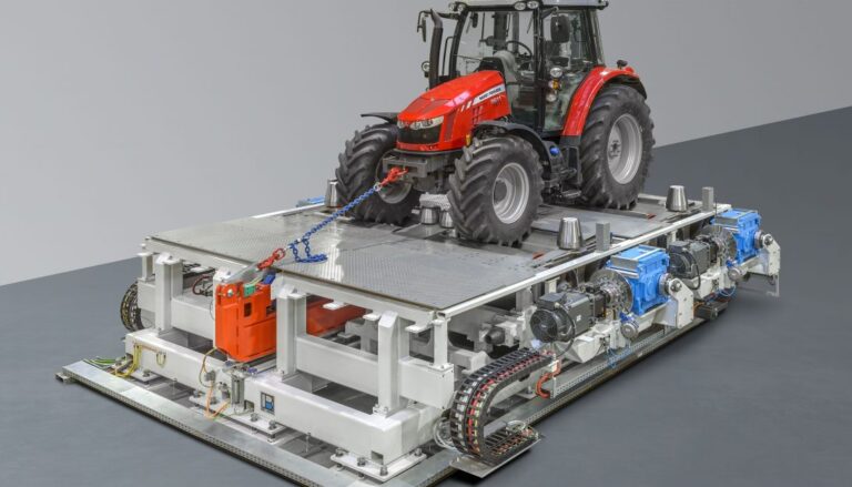 A tractor is sitting on top of a platform.
