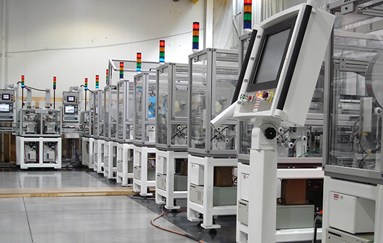 A line of machines in a factory.